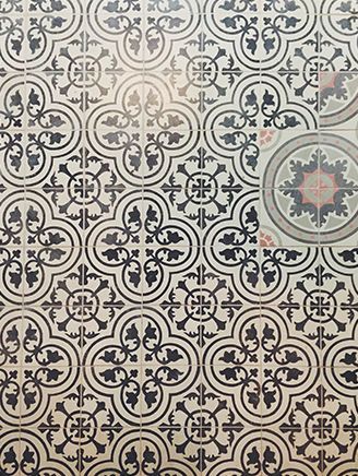Patterned encaustic floor tiles in the restaurant